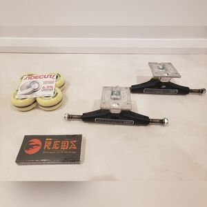 2 Krux Skateboard Trucks, Bones Reds Bearings, 4 Sidecuts Wheels